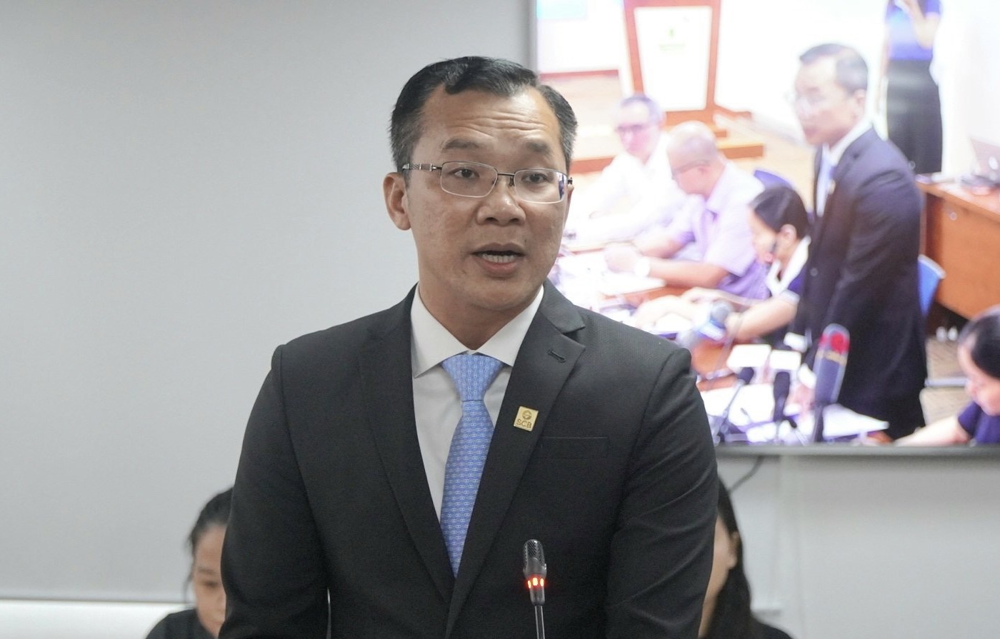 Ông Hoàng Minh Hoàn, Phó Tổng giám đốc Phụ trách điều hành Ngân hàng TMCP Sài Gòn (SCB) phát biểu tại buổi họp báo.