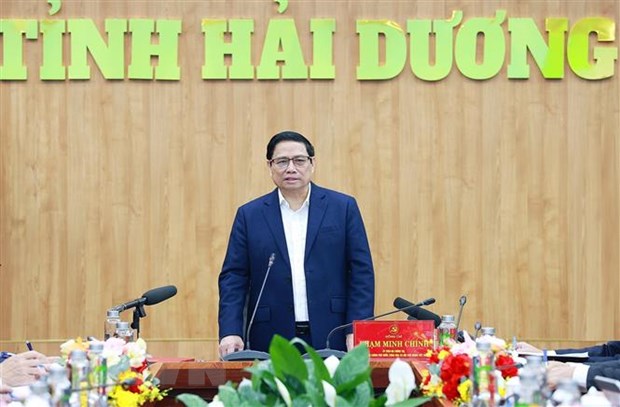 Thủ tướng Phạm Minh Chính làm việc với lãnh đạo chủ chốt tỉnh Hải Dương. (Ảnh: Dương Giang/TTXVN).
