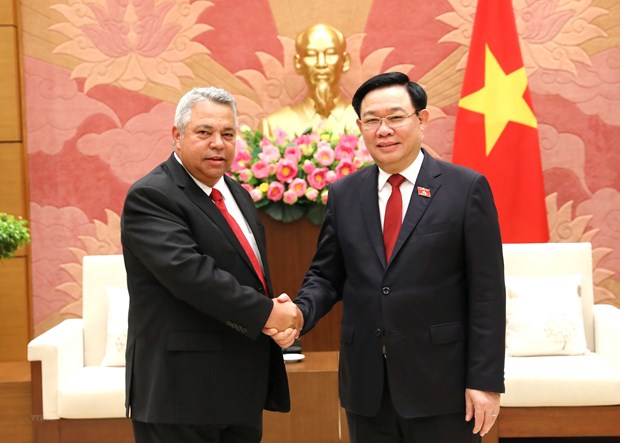Chủ tịch Quốc hội Vương Đình Huệ tiếp ông Ulises Guilarte de Nacimiento, Ủy viên Bộ Chính trị, Phó Chủ tịch Liên hiệp Công đoàn Thế giới, tháng Sáu vừa qua. (Ảnh: An Đăng/TTXVN).
